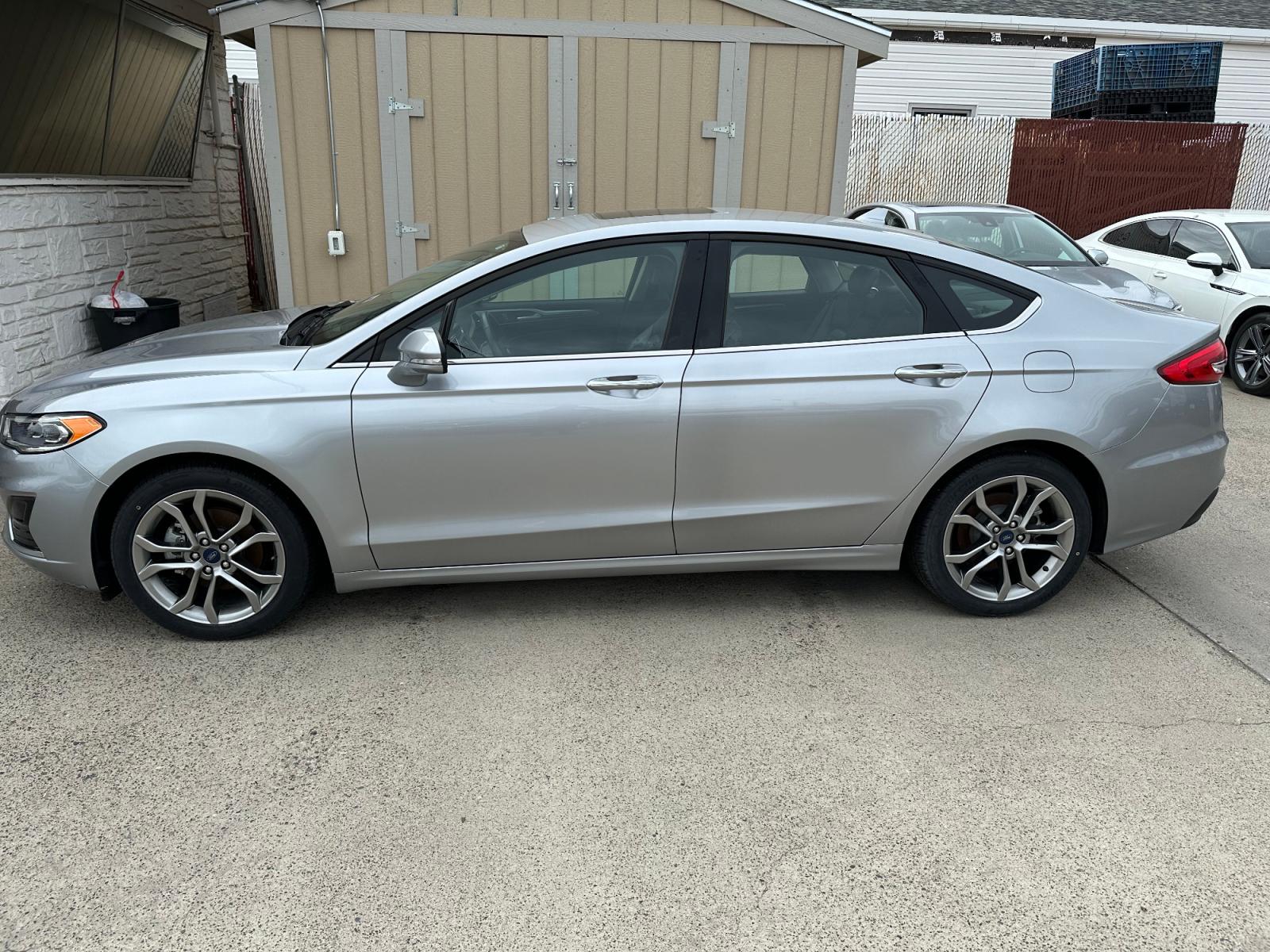 2020 SILVER Ford Fusion SEL (3FA6P0CD1LR) with an 1.5L L4 DOHC 16V engine, 6A transmission, located at 3200 1st Avenue North, Billings, MT, 59101, (406) 245-9055, 45.779270, -108.510742 - This is One of Our Luxury Vehicles Available for Rent. SEL Package with Leather, Moonroof, Power Heated Seats, 27,000 Miles. Auto Brokers of Montana/AA&A Auto Rental/Fox Car Rental Billings - Photo #1