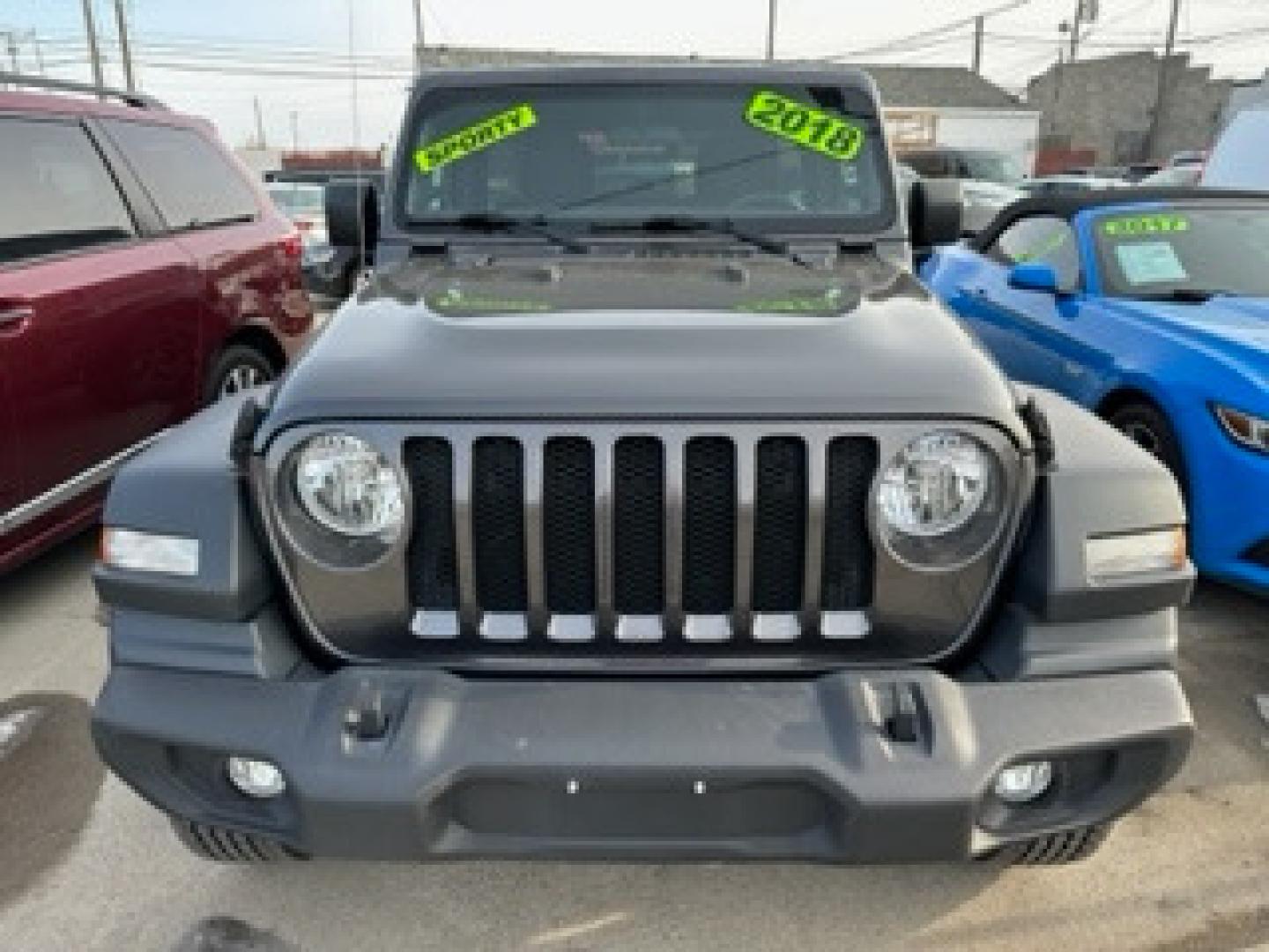 2018 SILVER Jeep Wrangler JK Unlimited Sport (1C4HJXDG8JW) with an 3.6L V6 DOHC 24V FFV engine, 6A transmission, located at 3200 1st Avenue North, Billings, MT, 59101, (406) 245-9055, 45.779270, -108.510742 - Super Sharp Jeep Unlimited Sport 4 door Hardtop! Automatic, 6 Cylinder Engine, Air Conditioning, Sport Package, Rear Mounted Spare Tire, Tow Package, One Owner and Much More! CarFax Dealer. Auto Brokers of Montana/AA&A Auto Rental/Fox Car Rental Billings - Photo#0