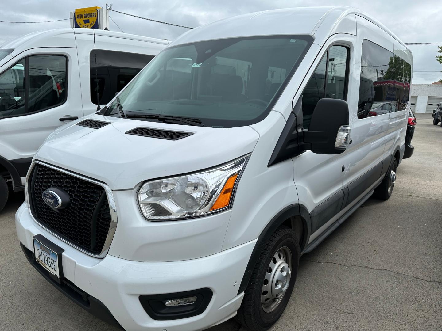 2022 White /Gray Ford Transit 350 Wagon Med. Roof XLT w/Sliding Pass. 148-in. WB (1FBAX9C85NK) with an 3.5L V6 DOHC 24V engine, 6A transmission, located at 3200 1st Avenue North, Billings, MT, 59101, (406) 245-9055, 45.779270, -108.510742 - This is One of Our Super Vehicles Available for Rent. 12 Passenger Seating, Power Heated Seats, Tilt Steering, Cruise Control, Air Conditioning, Towing, All Wheel Drive, Larger Fuel Tank, and Many More Custom Options! CarFax Dealer Auto Brokers of Montana/AA&A Auto Rental/Fox Car Rental Billings - Photo#0