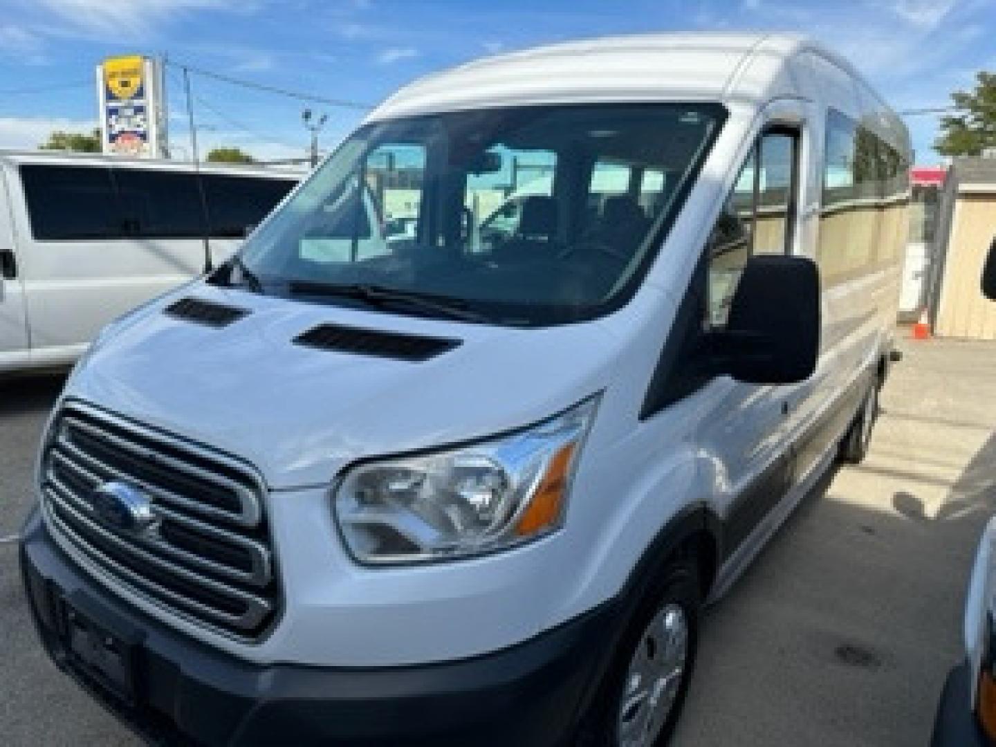 2016 White /Gray Ford Transit 350 Wagon Med. Roof XLT w/Sliding Pass. 148-in. WB (1FBAX2CG3GK) with an 3.5L V6 DOHC 24V engine, 6A transmission, located at 3200 1st Avenue North, Billings, MT, 59101, (406) 245-9055, 45.779270, -108.510742 - FRESH OFF-LEASED AND WELL MAINTAINED! 15 Passenger with Tow Package, Power Windows, Power Door Locks, Passenger Side Running Board, Tilt Steering, Rear A/C and Heat and Much More. CarFax Dealer Auto Brokers of Montana/AA&A Auto Rental/Fox Car Rental in Billings - Photo#0