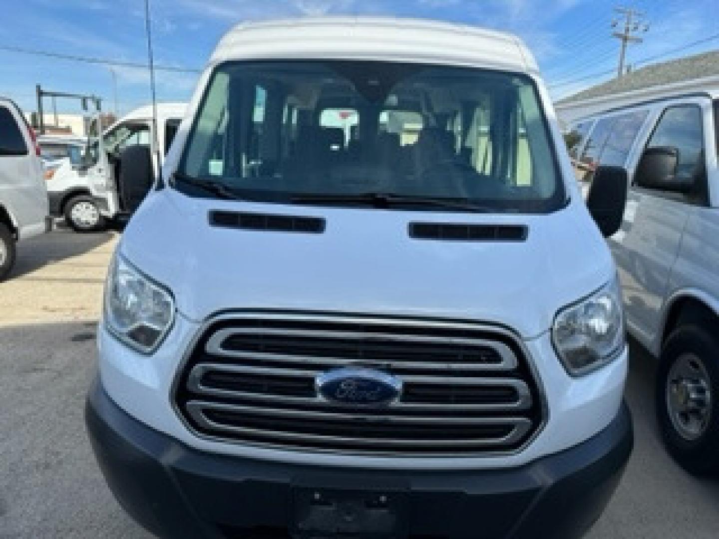 2016 White /Gray Ford Transit 350 Wagon Med. Roof XLT w/Sliding Pass. 148-in. WB (1FBAX2CG3GK) with an 3.5L V6 DOHC 24V engine, 6A transmission, located at 3200 1st Avenue North, Billings, MT, 59101, (406) 245-9055, 45.779270, -108.510742 - FRESH OFF-LEASED AND WELL MAINTAINED! 15 Passenger with Tow Package, Power Windows, Power Door Locks, Passenger Side Running Board, Tilt Steering, Rear A/C and Heat and Much More. CarFax Dealer Auto Brokers of Montana/AA&A Auto Rental/Fox Car Rental in Billings - Photo#1