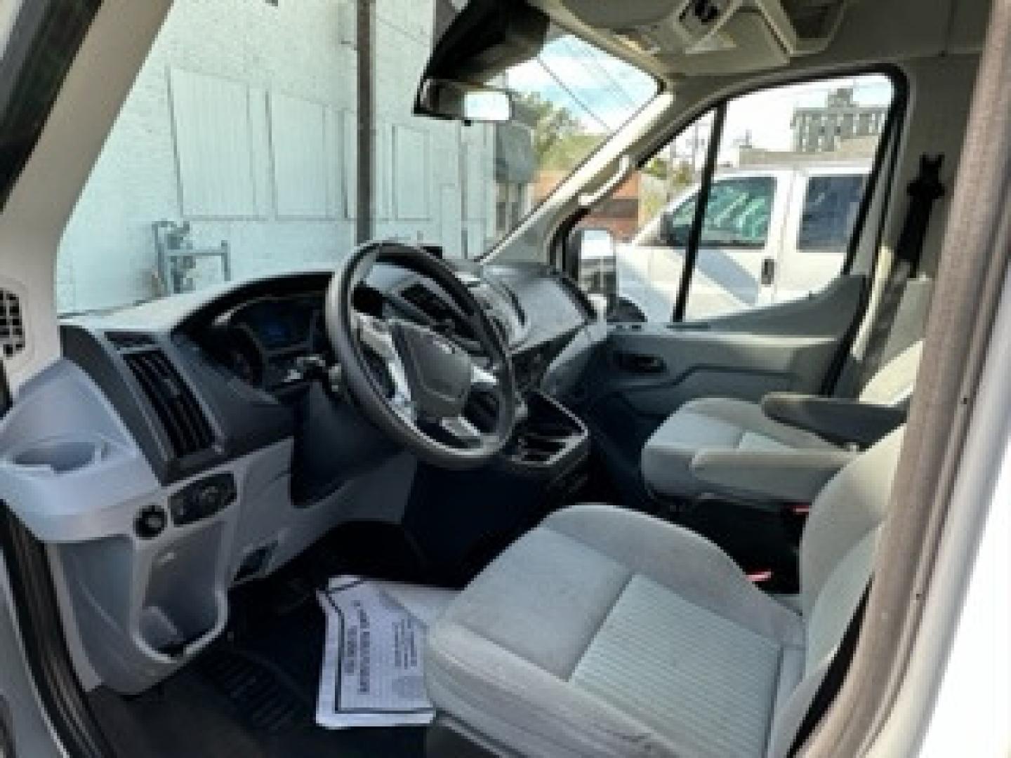 2016 White /Gray Ford Transit 350 Wagon Med. Roof XLT w/Sliding Pass. 148-in. WB (1FBAX2CG3GK) with an 3.5L V6 DOHC 24V engine, 6A transmission, located at 3200 1st Avenue North, Billings, MT, 59101, (406) 245-9055, 45.779270, -108.510742 - FRESH OFF-LEASED AND WELL MAINTAINED! 15 Passenger with Tow Package, Power Windows, Power Door Locks, Passenger Side Running Board, Tilt Steering, Rear A/C and Heat and Much More. CarFax Dealer Auto Brokers of Montana/AA&A Auto Rental/Fox Car Rental in Billings - Photo#7