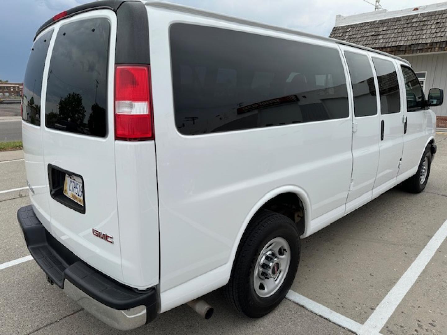 2020 White /Beige Cloth GMC Savana LT 3500 Ext. (1GJZ7PFG8L1) with an 6.0L V8 OHV 16V FFV engine, 6A transmission, located at 3200 1st Avenue North, Billings, MT, 59101, (406) 245-9055, 45.779270, -108.510742 - Super Hard to Find! One of Our 15 Passenger Vans that Just Came Off-Lease with Low Mileage, Power Windows, Power Door Locks, Rear Air Conditioning, Rear Heat, Tilt Steering Column, Cruise Control, Has a Tow Hitch, 6.0 Liter V8 and Only 47,000 Miles! CarFax Dealer. Auto Brokers of Montana/AA&A Aut - Photo#3