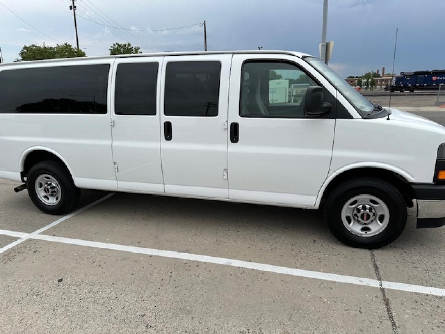 2020 White /Beige Cloth GMC Savana LT 3500 Ext. (1GJZ7PFG8L1) with an 6.0L V8 OHV 16V FFV engine, 6A transmission, located at 3200 1st Avenue North, Billings, MT, 59101, (406) 245-9055, 45.779270, -108.510742 - Super Hard to Find! One of Our 15 Passenger Vans that Just Came Off-Lease with Low Mileage, Power Windows, Power Door Locks, Rear Air Conditioning, Rear Heat, Tilt Steering Column, Cruise Control, Has a Tow Hitch, 6.0 Liter V8 and Only 47,000 Miles! CarFax Dealer. Auto Brokers of Montana/AA&A Aut - Photo#4