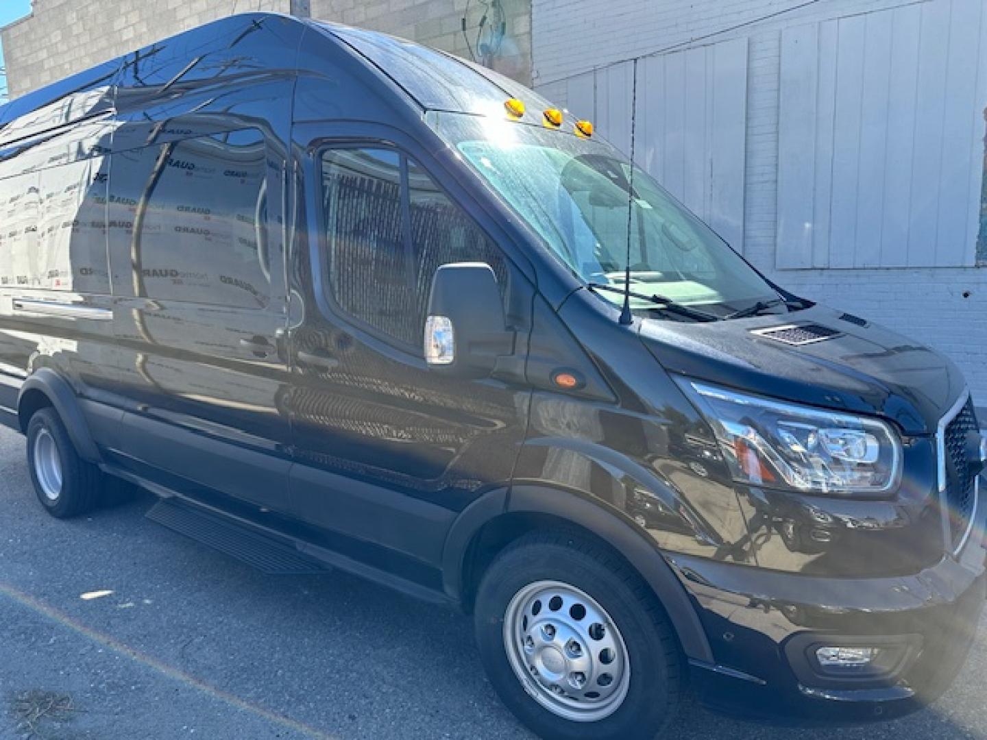 2023 Agate Black Metallic /Ebony Leather Ford Transit 350 Wagon HD High Roof XLT Sliding Pass. 148 WB EL (1FBVU5XG4PK) with an 3.5L V6 DOHC 24V engine, 6A transmission, located at 3200 1st Avenue North, Billings, MT, 59101, (406) 245-9055, 45.779270, -108.510742 - Luxury All Wheel Drive 'Limo' with Less Than 6,000 Miles. 3.5L EcoBoost Engine, Dual Power Seats, Leather Interior, High Roof, Dually Wheels, All Wheel Drive, Blind Spot Assist, Pre-Collision Assist, Heavy Duty Front Axle, Cruise Control, Tit Steering Column, Upfitter Package, Front/Rear Air Conditi - Photo#0