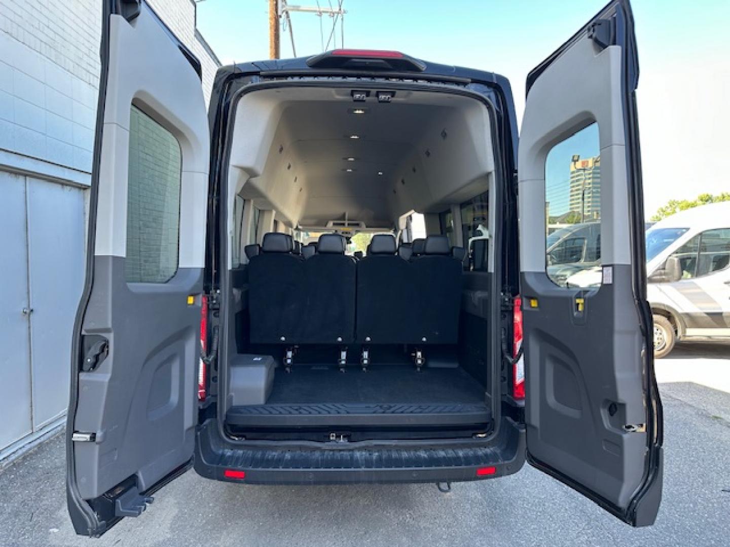 2023 Agate Black Metallic /Ebony Leather Ford Transit 350 Wagon HD High Roof XLT Sliding Pass. 148 WB EL (1FBVU5XG4PK) with an 3.5L V6 DOHC 24V engine, 6A transmission, located at 3200 1st Avenue North, Billings, MT, 59101, (406) 245-9055, 45.779270, -108.510742 - Luxury All Wheel Drive 'Limo' with Less Than 6,000 Miles. 3.5L EcoBoost Engine, Dual Power Seats, Leather Interior, High Roof, Dually Wheels, All Wheel Drive, Blind Spot Assist, Pre-Collision Assist, Heavy Duty Front Axle, Cruise Control, Tit Steering Column, Upfitter Package, Front/Rear Air Conditi - Photo#15