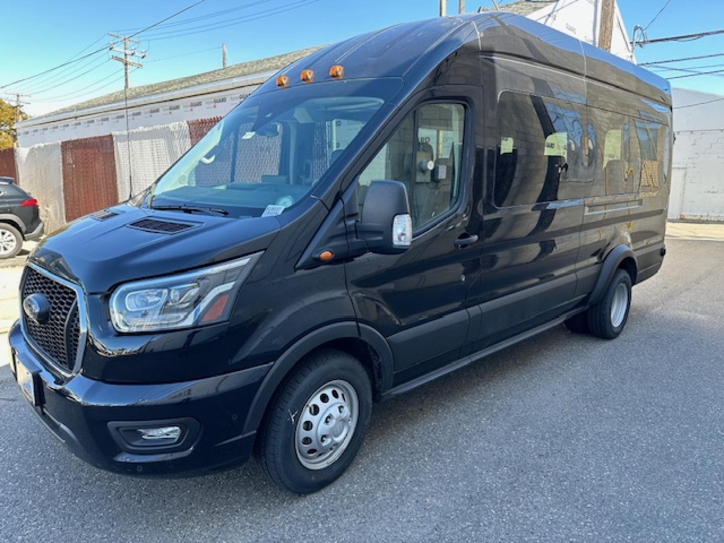 2023 Agate Black Metallic /Ebony Leather Ford Transit 350 Wagon HD High Roof XLT Sliding Pass. 148 WB EL (1FBVU5XG4PK) with an 3.5L V6 DOHC 24V engine, 6A transmission, located at 3200 1st Avenue North, Billings, MT, 59101, (406) 245-9055, 45.779270, -108.510742 - Luxury All Wheel Drive 'Limo' with Less Than 6,000 Miles. 3.5L EcoBoost Engine, Dual Power Seats, Leather Interior, High Roof, Dually Wheels, All Wheel Drive, Blind Spot Assist, Pre-Collision Assist, Heavy Duty Front Axle, Cruise Control, Tit Steering Column, Upfitter Package, Front/Rear Air Conditi - Photo#2