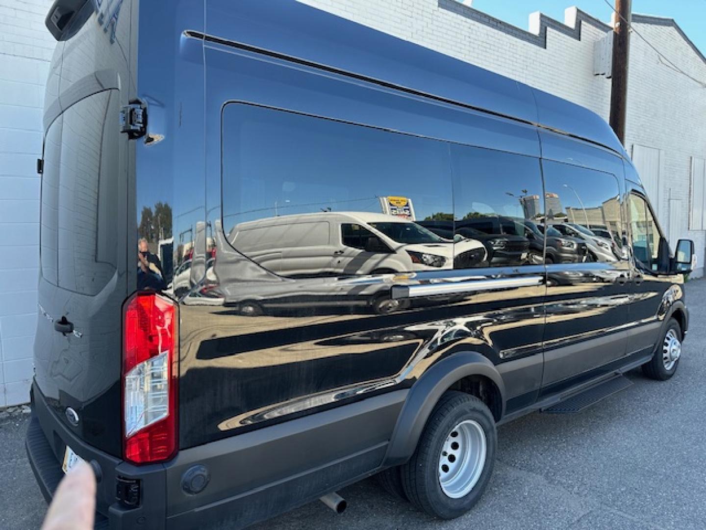 2023 Agate Black Metallic /Ebony Leather Ford Transit 350 Wagon HD High Roof XLT Sliding Pass. 148 WB EL (1FBVU5XG4PK) with an 3.5L V6 DOHC 24V engine, 6A transmission, located at 3200 1st Avenue North, Billings, MT, 59101, (406) 245-9055, 45.779270, -108.510742 - Luxury All Wheel Drive 'Limo' with Less Than 6,000 Miles. 3.5L EcoBoost Engine, Dual Power Seats, Leather Interior, High Roof, Dually Wheels, All Wheel Drive, Blind Spot Assist, Pre-Collision Assist, Heavy Duty Front Axle, Cruise Control, Tit Steering Column, Upfitter Package, Front/Rear Air Conditi - Photo#3