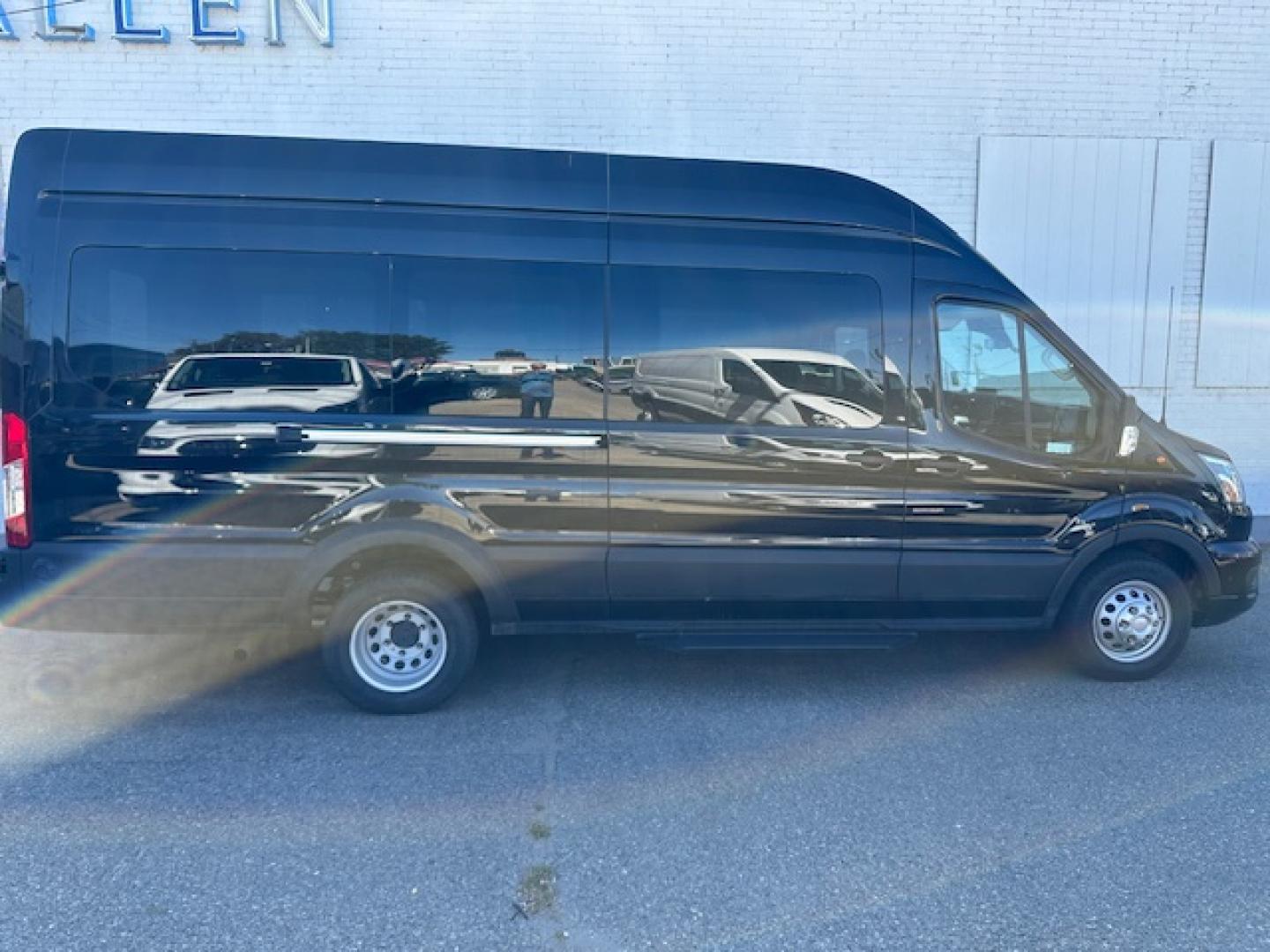 2023 Agate Black Metallic /Ebony Leather Ford Transit 350 Wagon HD High Roof XLT Sliding Pass. 148 WB EL (1FBVU5XG4PK) with an 3.5L V6 DOHC 24V engine, 6A transmission, located at 3200 1st Avenue North, Billings, MT, 59101, (406) 245-9055, 45.779270, -108.510742 - Luxury All Wheel Drive 'Limo' with Less Than 6,000 Miles. 3.5L EcoBoost Engine, Dual Power Seats, Leather Interior, High Roof, Dually Wheels, All Wheel Drive, Blind Spot Assist, Pre-Collision Assist, Heavy Duty Front Axle, Cruise Control, Tit Steering Column, Upfitter Package, Front/Rear Air Conditi - Photo#4