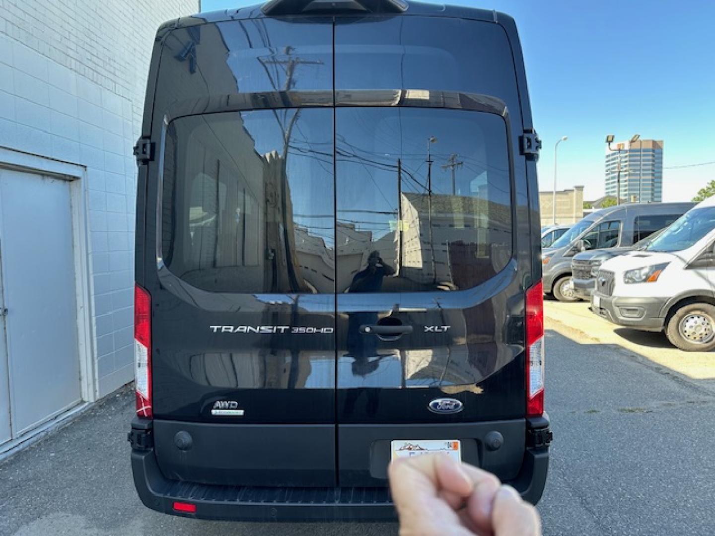 2023 Agate Black Metallic /Ebony Leather Ford Transit 350 Wagon HD High Roof XLT Sliding Pass. 148 WB EL (1FBVU5XG4PK) with an 3.5L V6 DOHC 24V engine, 6A transmission, located at 3200 1st Avenue North, Billings, MT, 59101, (406) 245-9055, 45.779270, -108.510742 - Luxury All Wheel Drive 'Limo' with Less Than 6,000 Miles. 3.5L EcoBoost Engine, Dual Power Seats, Leather Interior, High Roof, Dually Wheels, All Wheel Drive, Blind Spot Assist, Pre-Collision Assist, Heavy Duty Front Axle, Cruise Control, Tit Steering Column, Upfitter Package, Front/Rear Air Conditi - Photo#5