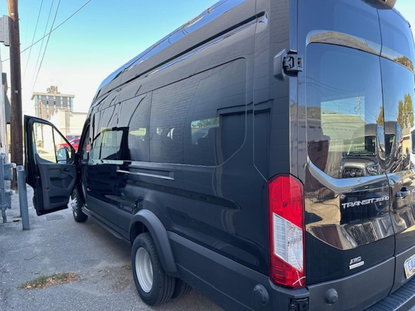 2023 Agate Black Metallic /Ebony Leather Ford Transit 350 Wagon HD High Roof XLT Sliding Pass. 148 WB EL (1FBVU5XG4PK) with an 3.5L V6 DOHC 24V engine, 6A transmission, located at 3200 1st Avenue North, Billings, MT, 59101, (406) 245-9055, 45.779270, -108.510742 - Luxury All Wheel Drive 'Limo' with Less Than 6,000 Miles. 3.5L EcoBoost Engine, Dual Power Seats, Leather Interior, High Roof, Dually Wheels, All Wheel Drive, Blind Spot Assist, Pre-Collision Assist, Heavy Duty Front Axle, Cruise Control, Tit Steering Column, Upfitter Package, Front/Rear Air Conditi - Photo#6