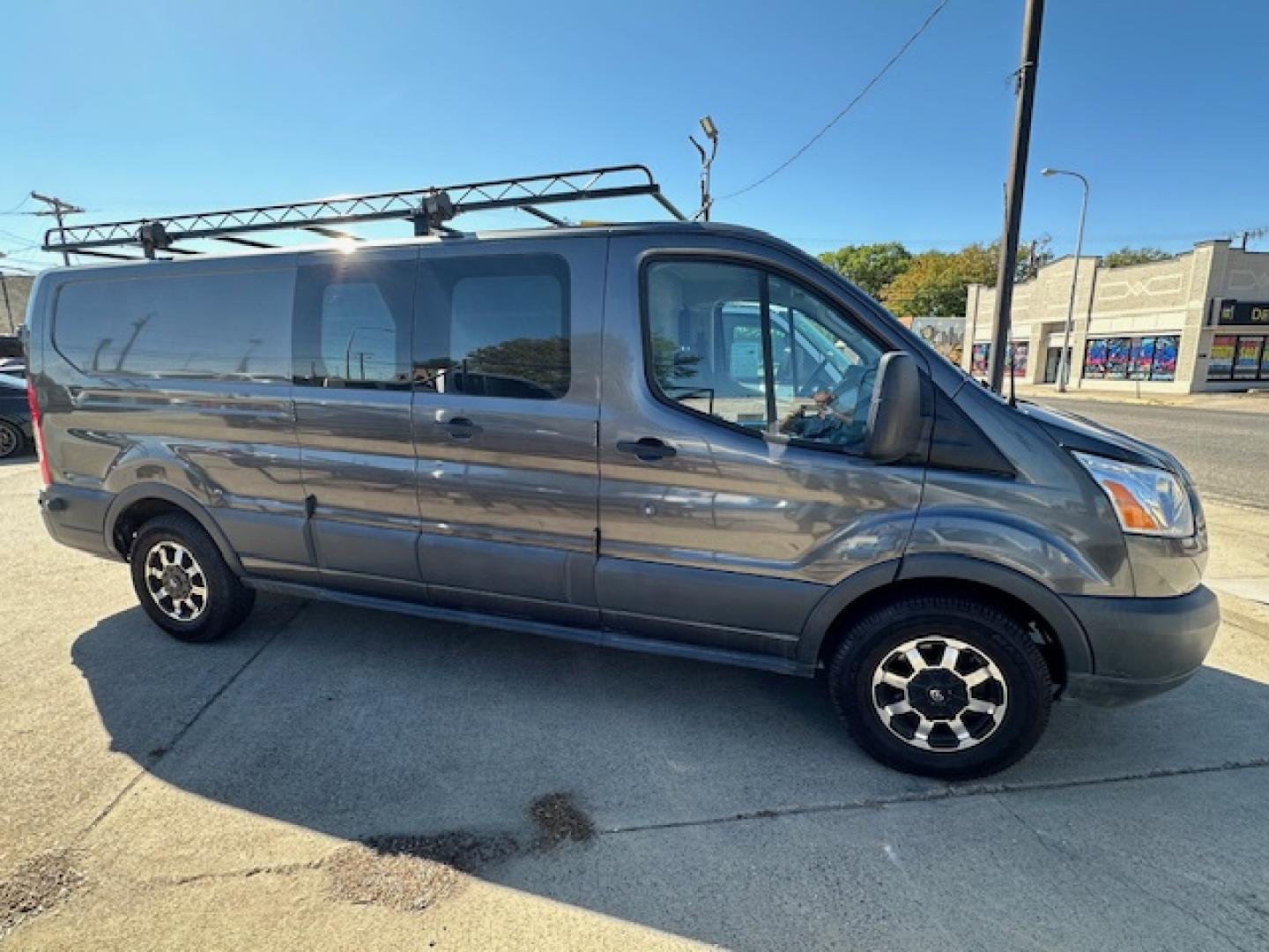 2016 Gray Ford Transit 150 Van Low Roof 60/40 Pass. 148-in. WB (1FTYE9ZM9GK) with an 3.7L V6 DOHC 24V engine, 6A transmission, located at 3200 1st Avenue North, Billings, MT, 59101, (406) 245-9055, 45.779270, -108.510742 - Local Trade-In with a Lot of Extras! Bulkhead, Air Conditioning, Automatic Transmission, Power Windows, Power Door Locks, Roof Equipment Rack, Tilt Steering Column, Tow Package, Wheels, Cruise Control, 148" Wheel Base and Great Price! CarFax Dealer. Auto Brokers of Montana/AA&A Auto Rental/Fox Ca - Photo#4