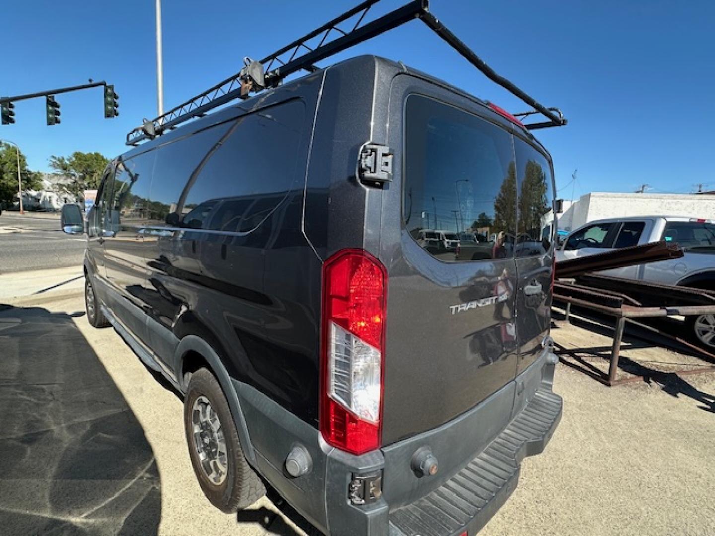 2016 Gray Ford Transit 150 Van Low Roof 60/40 Pass. 148-in. WB (1FTYE9ZM9GK) with an 3.7L V6 DOHC 24V engine, 6A transmission, located at 3200 1st Avenue North, Billings, MT, 59101, (406) 245-9055, 45.779270, -108.510742 - Local Trade-In with a Lot of Extras! Bulkhead, Air Conditioning, Automatic Transmission, Power Windows, Power Door Locks, Roof Equipment Rack, Tilt Steering Column, Tow Package, Wheels, Cruise Control, 148" Wheel Base and Great Price! CarFax Dealer. Auto Brokers of Montana/AA&A Auto Rental/Fox Ca - Photo#6