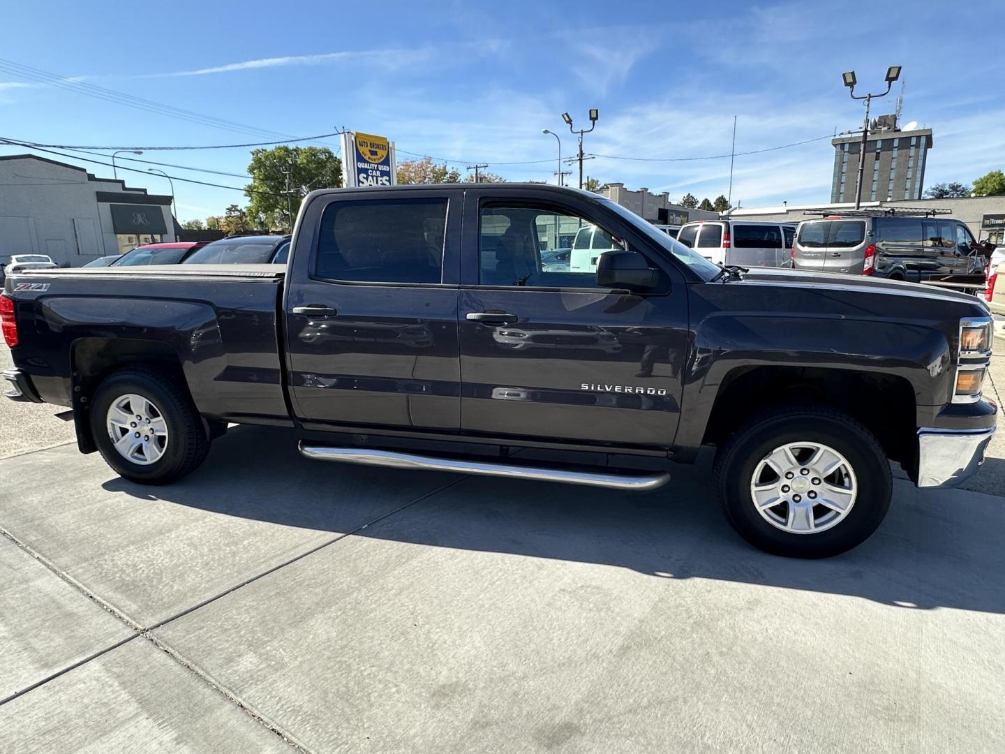 2014 Brown /Brown Chevrolet Silverado 1500 1LT Crew Cab 4WD (3GCUKREH0EG) with an 4.3L V6 OHV 12V engine, 6-Speed Automatic transmission, located at 3200 1st Avenue North, Billings, MT, 59101, (406) 245-9055, 45.779270, -108.510742 - Local 4X4 Fleet Vehicle with Good Miles, Regular Maintenance Intervals & Great Price! Power Windows, Power Door Locks, Remote Fob Entry, Bed Liner, Tonneau Cover, Tilt Steering Column, Automatic Transmission, Cruise Control, Running Boards and Much More. CarFax Dealer Auto Brokers of Montana/AA& - Photo#3