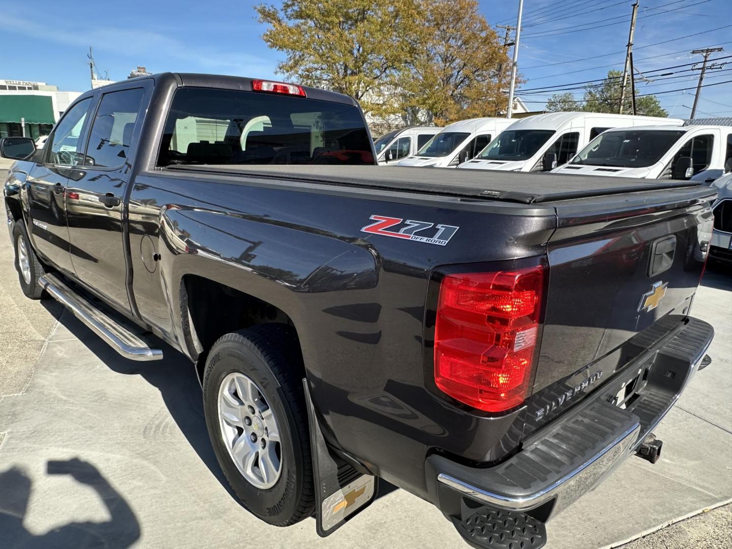 2014 Brown /Brown Chevrolet Silverado 1500 1LT Crew Cab 4WD (3GCUKREH0EG) with an 4.3L V6 OHV 12V engine, 6-Speed Automatic transmission, located at 3200 1st Avenue North, Billings, MT, 59101, (406) 245-9055, 45.779270, -108.510742 - Local 4X4 Fleet Vehicle with Good Miles, Regular Maintenance Intervals & Great Price! Power Windows, Power Door Locks, Remote Fob Entry, Bed Liner, Tonneau Cover, Tilt Steering Column, Automatic Transmission, Cruise Control, Running Boards and Much More. CarFax Dealer Auto Brokers of Montana/AA& - Photo#5