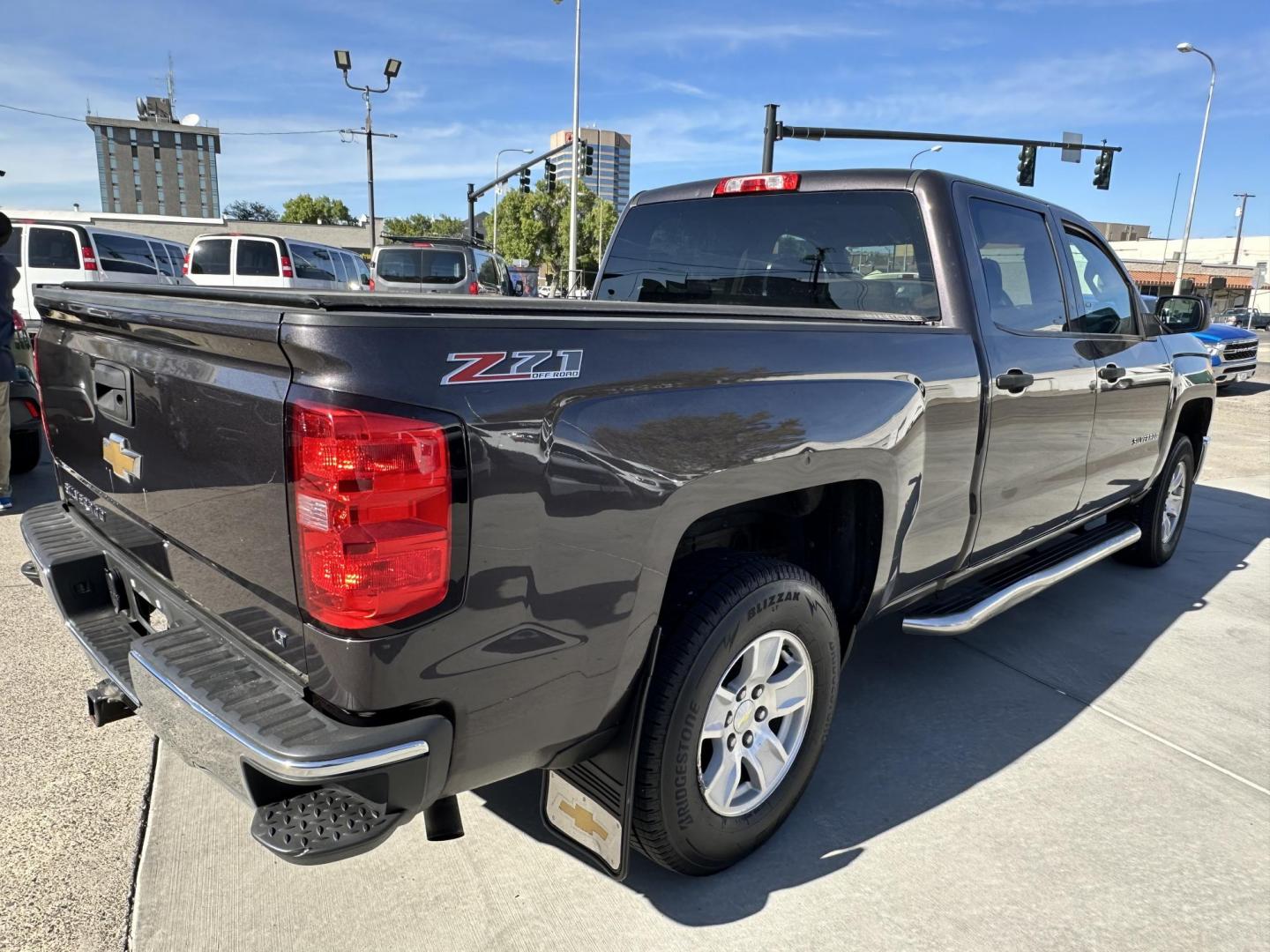 2014 Brown /Brown Chevrolet Silverado 1500 1LT Crew Cab 4WD (3GCUKREH0EG) with an 4.3L V6 OHV 12V engine, 6-Speed Automatic transmission, located at 3200 1st Avenue North, Billings, MT, 59101, (406) 245-9055, 45.779270, -108.510742 - Local 4X4 Fleet Vehicle with Good Miles, Regular Maintenance Intervals & Great Price! Power Windows, Power Door Locks, Remote Fob Entry, Bed Liner, Tonneau Cover, Tilt Steering Column, Automatic Transmission, Cruise Control, Running Boards and Much More. CarFax Dealer Auto Brokers of Montana/AA& - Photo#6