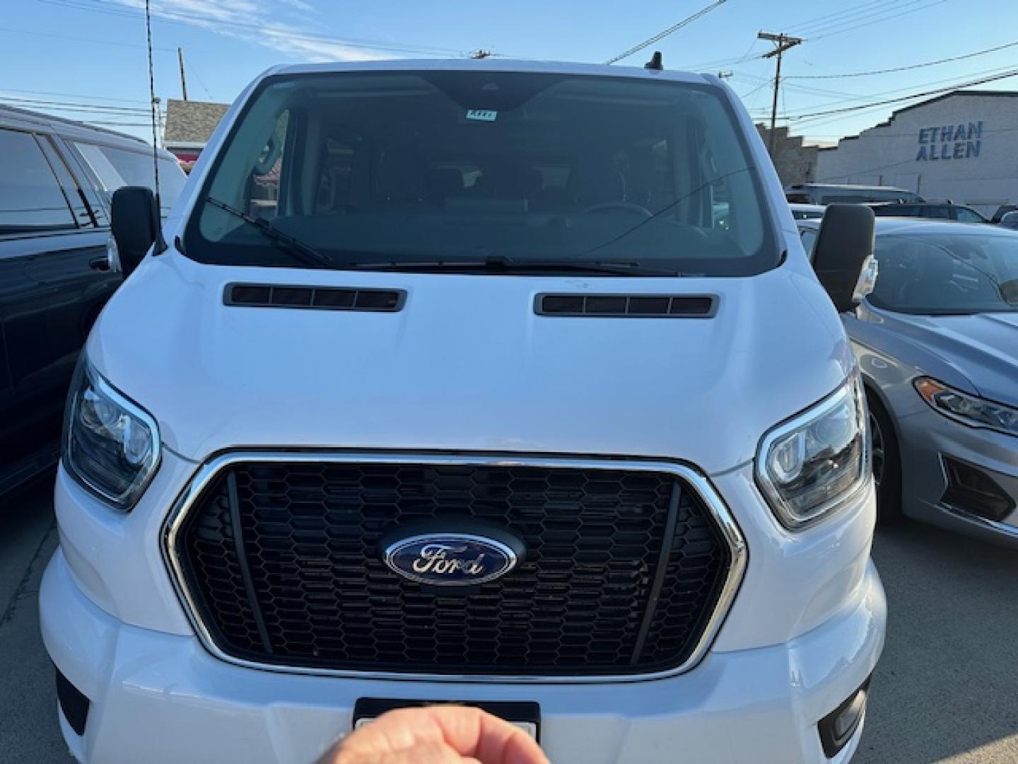 2023 White /Gray Ford Transit 350 Wagon Low Roof XL w/Sliding Pass. 148-in. WB (1FBAX9Y80PK) with an 3.5L V6 DOHC 24V engine, 6A transmission, located at 3200 1st Avenue North, Billings, MT, 59101, (406) 245-9055, 45.779270, -108.510742 - One of Our Lease Vehicles Available for Purchase or Rent. One Owner with Dual Power Front Seats, Cold Climate Control Package, Extended Range Fuel Tank Capacity, Factory Towing, Large Screen Display, Front and Rear Air Conditioning and Heat, Factory Privacy Glass and Less than 16,000 Miles! CarFax D - Photo#0