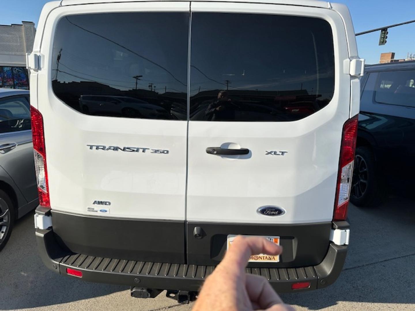 2023 White /Gray Ford Transit 350 Wagon Low Roof XL w/Sliding Pass. 148-in. WB (1FBAX9Y80PK) with an 3.5L V6 DOHC 24V engine, 6A transmission, located at 3200 1st Avenue North, Billings, MT, 59101, (406) 245-9055, 45.779270, -108.510742 - One of Our Lease Vehicles Available for Purchase or Rent. One Owner with Dual Power Front Seats, Cold Climate Control Package, Extended Range Fuel Tank Capacity, Factory Towing, Large Screen Display, Front and Rear Air Conditioning and Heat, Factory Privacy Glass and Less than 16,000 Miles! CarFax D - Photo#7