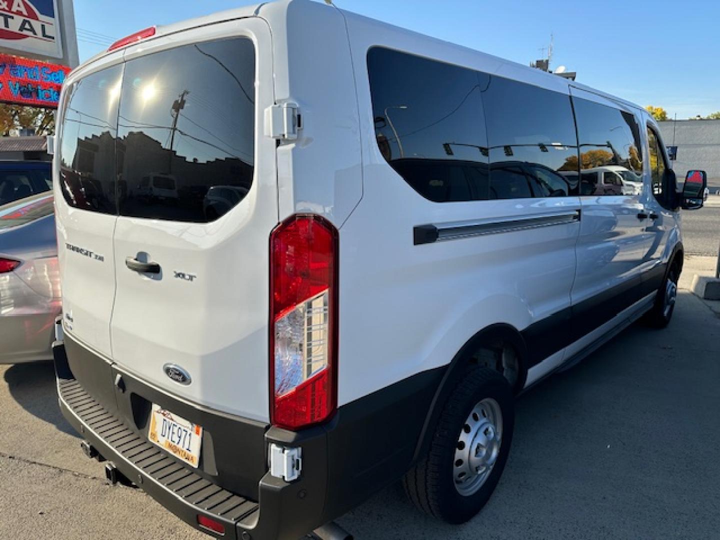 2023 White /Gray Ford Transit 350 Wagon Low Roof XL w/Sliding Pass. 148-in. WB (1FBAX9Y80PK) with an 3.5L V6 DOHC 24V engine, 6A transmission, located at 3200 1st Avenue North, Billings, MT, 59101, (406) 245-9055, 45.779270, -108.510742 - One of Our Lease Vehicles Available for Purchase or Rent. One Owner with Dual Power Front Seats, Cold Climate Control Package, Extended Range Fuel Tank Capacity, Factory Towing, Large Screen Display, Front and Rear Air Conditioning and Heat, Factory Privacy Glass and Less than 16,000 Miles! CarFax D - Photo#8