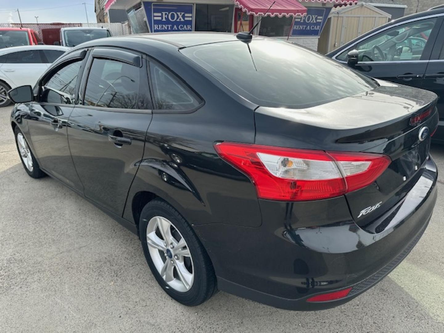 2013 Black /Gray Ford Focus SE Sedan (1FADP3F23DL) with an 2.0L L4 DOHC 16V engine, located at 3200 1st Avenue North, Billings, MT, 59101, (406) 245-9055, 45.779270, -108.510742 - Very nice Local Trade-In with Good Mileage and Great Price! Power Windows, Power Door Locks, Keyless Remote Entry, Air Conditioning, Tilt Steering Column, Cruise Speed Control, Automatic Transmission, Alloy Wheels and More. CarFax Dealer. Auto Brokers of Montana/AA&A Auto Rental/Fox Car Rental B - Photo#1