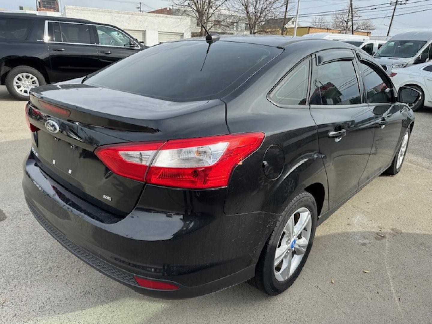 2013 Black /Gray Ford Focus SE Sedan (1FADP3F23DL) with an 2.0L L4 DOHC 16V engine, located at 3200 1st Avenue North, Billings, MT, 59101, (406) 245-9055, 45.779270, -108.510742 - Very nice Local Trade-In with Good Mileage and Great Price! Power Windows, Power Door Locks, Keyless Remote Entry, Air Conditioning, Tilt Steering Column, Cruise Speed Control, Automatic Transmission, Alloy Wheels and More. CarFax Dealer. Auto Brokers of Montana/AA&A Auto Rental/Fox Car Rental B - Photo#3