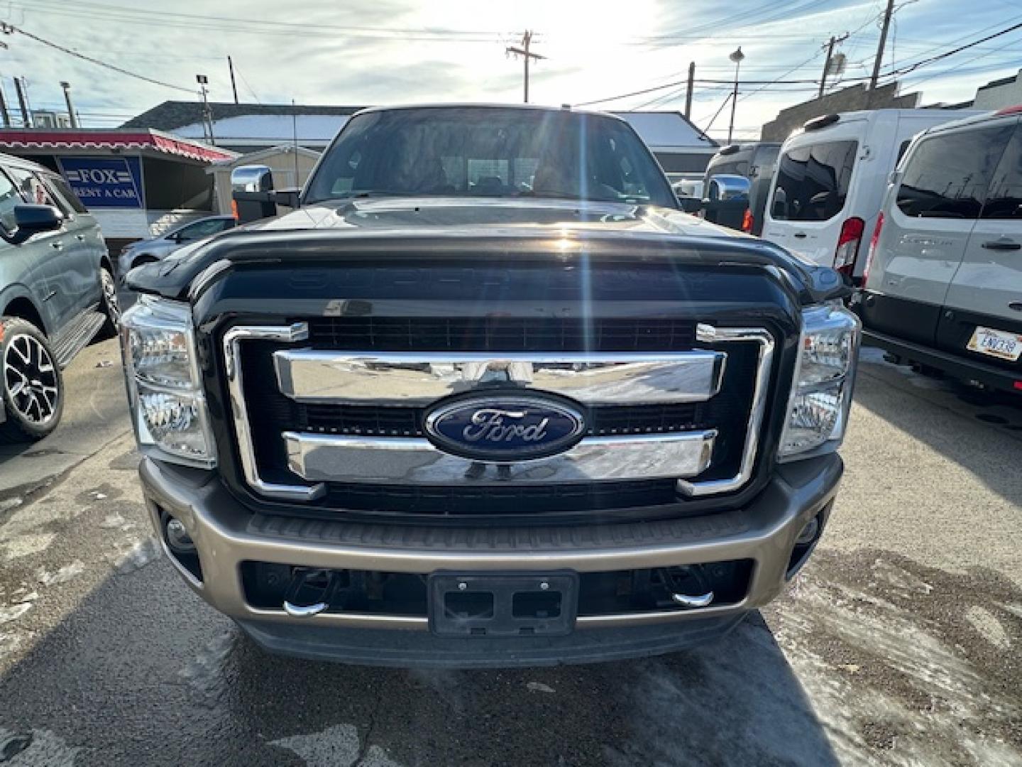 2014 Black /King Ranch Custom Interior Ford F-350 SD King Ranch Crew Cab 4WD (1FT8W3BT1EE) with an 6.7L V8 OHV 16V DIESEL engine, 6-Speed Automatic transmission, located at 3200 1st Avenue North, Billings, MT, 59101, (406) 245-9055, 45.779270, -108.510742 - Super Sharp Ford F350 Super Duty Crew Cab. Local Trade-In, Low Mileage, 6.7-16 Valve Diesel Power, Dual Power Seats, Power Windows, Power Door Locks, Automatic Transmission, Tow Package, Bed Liner, Running Boards, Recessible Ball Hitch, Lockable Tailgate, Blizzak Tires, Extra Set of Wheels & Tires f - Photo#0