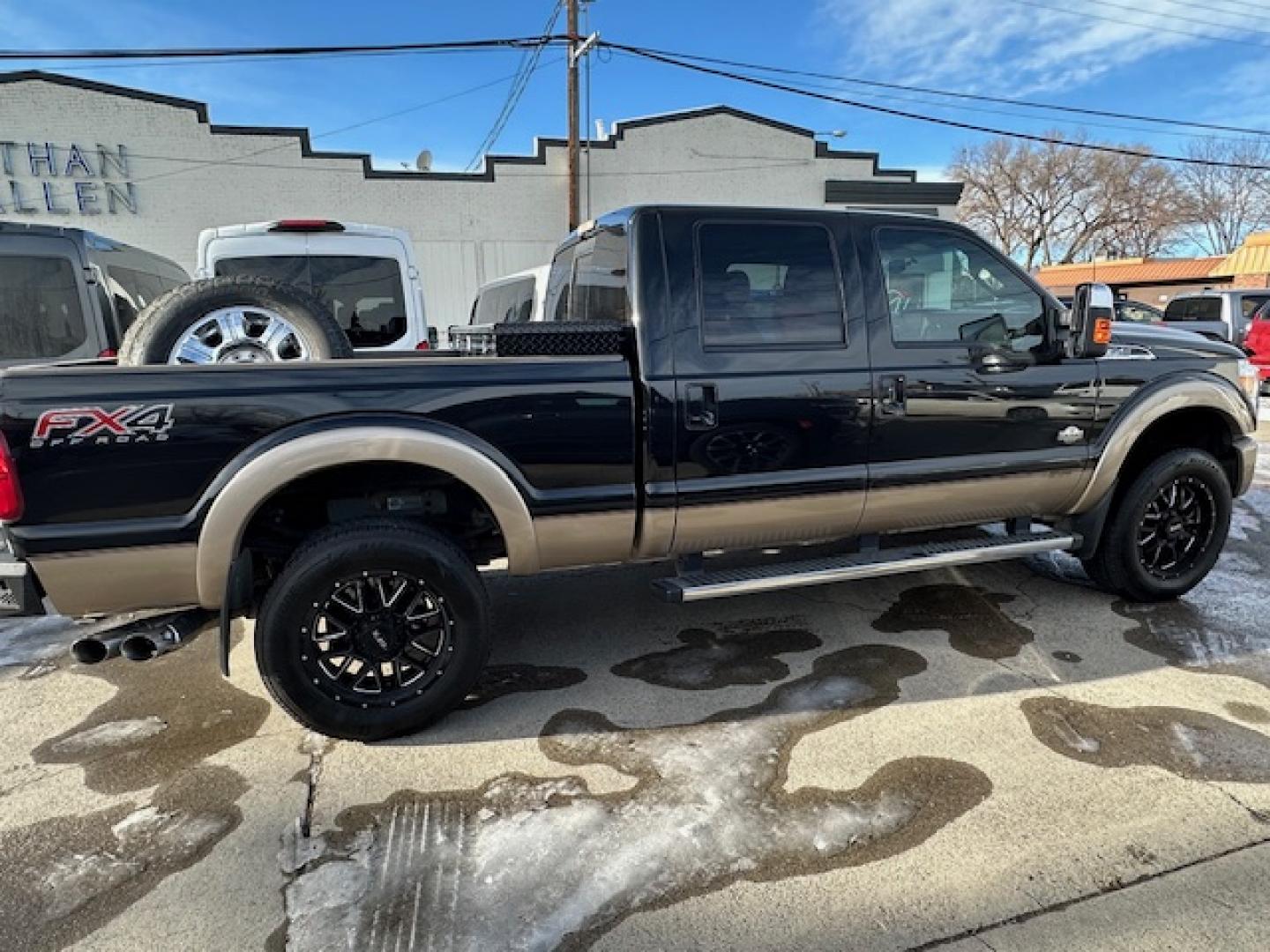 2014 Black /King Ranch Custom Interior Ford F-350 SD King Ranch Crew Cab 4WD (1FT8W3BT1EE) with an 6.7L V8 OHV 16V DIESEL engine, 6-Speed Automatic transmission, located at 3200 1st Avenue North, Billings, MT, 59101, (406) 245-9055, 45.779270, -108.510742 - Super Sharp Ford F350 Super Duty Crew Cab. Local Trade-In, Low Mileage, 6.7-16 Valve Diesel Power, Dual Power Seats, Power Windows, Power Door Locks, Automatic Transmission, Tow Package, Bed Liner, Running Boards, Recessible Ball Hitch, Lockable Tailgate, Blizzak Tires, Extra Set of Wheels & Tires f - Photo#4