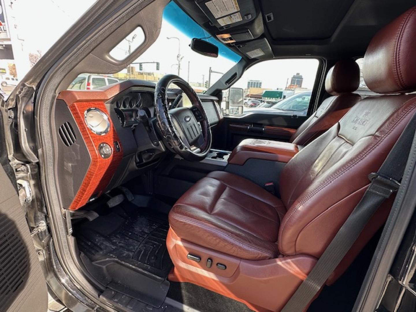 2014 Black /King Ranch Custom Interior Ford F-350 SD King Ranch Crew Cab 4WD (1FT8W3BT1EE) with an 6.7L V8 OHV 16V DIESEL engine, 6-Speed Automatic transmission, located at 3200 1st Avenue North, Billings, MT, 59101, (406) 245-9055, 45.779270, -108.510742 - Super Sharp Ford F350 Super Duty Crew Cab. Local Trade-In, Low Mileage, 6.7-16 Valve Diesel Power, Dual Power Seats, Power Windows, Power Door Locks, Automatic Transmission, Tow Package, Bed Liner, Running Boards, Recessible Ball Hitch, Lockable Tailgate, Blizzak Tires, Extra Set of Wheels & Tires f - Photo#6