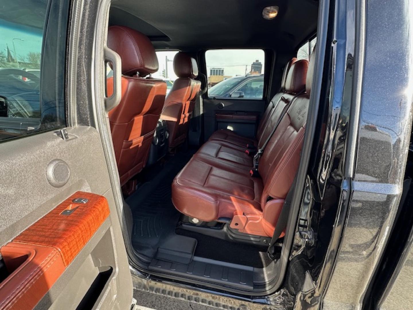 2014 Black /King Ranch Custom Interior Ford F-350 SD King Ranch Crew Cab 4WD (1FT8W3BT1EE) with an 6.7L V8 OHV 16V DIESEL engine, 6-Speed Automatic transmission, located at 3200 1st Avenue North, Billings, MT, 59101, (406) 245-9055, 45.779270, -108.510742 - Super Sharp Ford F350 Super Duty Crew Cab. Local Trade-In, Low Mileage, 6.7-16 Valve Diesel Power, Dual Power Seats, Power Windows, Power Door Locks, Automatic Transmission, Tow Package, Bed Liner, Running Boards, Recessible Ball Hitch, Lockable Tailgate, Blizzak Tires, Extra Set of Wheels & Tires f - Photo#7