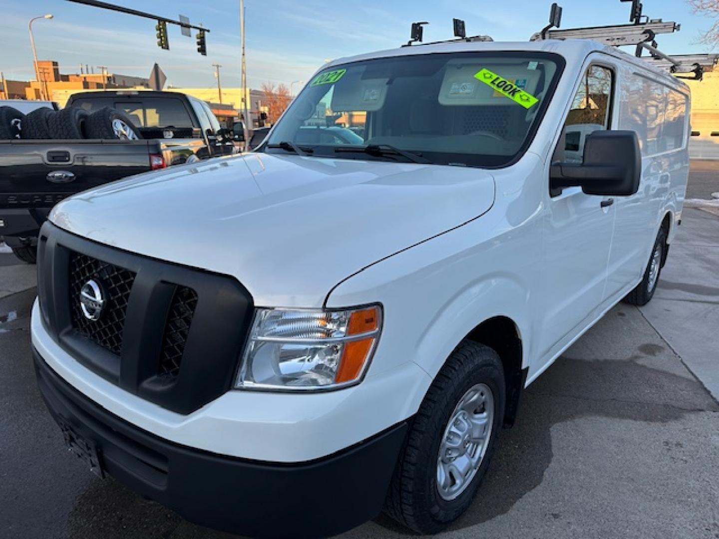 2021 White /Gray Nissan NV Cargo 2500 HD S V6 (1N6BF0KY2MN) with an 4.0L V6 engine, 5A transmission, located at 3200 1st Avenue North, Billings, MT, 59101, (406) 245-9055, 45.779270, -108.510742 - Very Hard to Find Nissan 3/4 Ton Cargo Van with Passenger Sliding Door, Power Windows, Power Door Locks, Remote Entry, Exterior Security Lock Hasps, Adrian Shelving and Commercial Drawers, Bulk Head, Adrian Roof Rack and Much More; Only 52,000 Miles. CarFax Dealer. Auto Brokers of Montana/AA&A Au - Photo#0