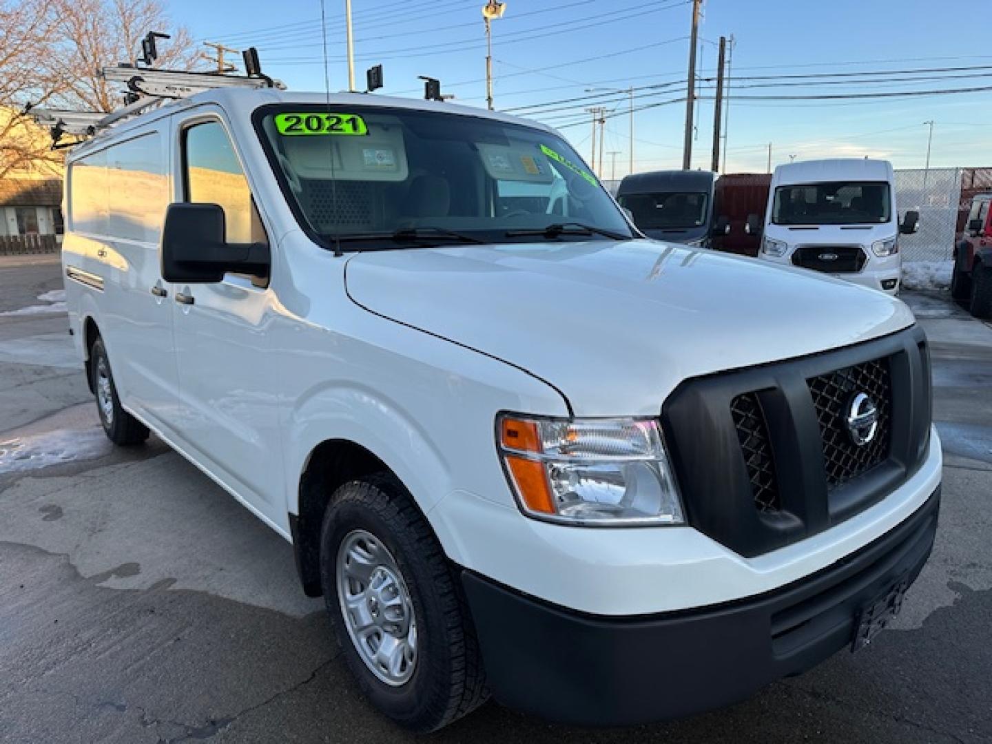 2021 White /Gray Nissan NV Cargo 2500 HD S V6 (1N6BF0KY2MN) with an 4.0L V6 engine, 5A transmission, located at 3200 1st Avenue North, Billings, MT, 59101, (406) 245-9055, 45.779270, -108.510742 - Very Hard to Find Nissan 3/4 Ton Cargo Van with Passenger Sliding Door, Power Windows, Power Door Locks, Remote Entry, Exterior Security Lock Hasps, Adrian Shelving and Commercial Drawers, Bulk Head, Adrian Roof Rack and Much More; Only 52,000 Miles. CarFax Dealer. Auto Brokers of Montana/AA&A Au - Photo#2