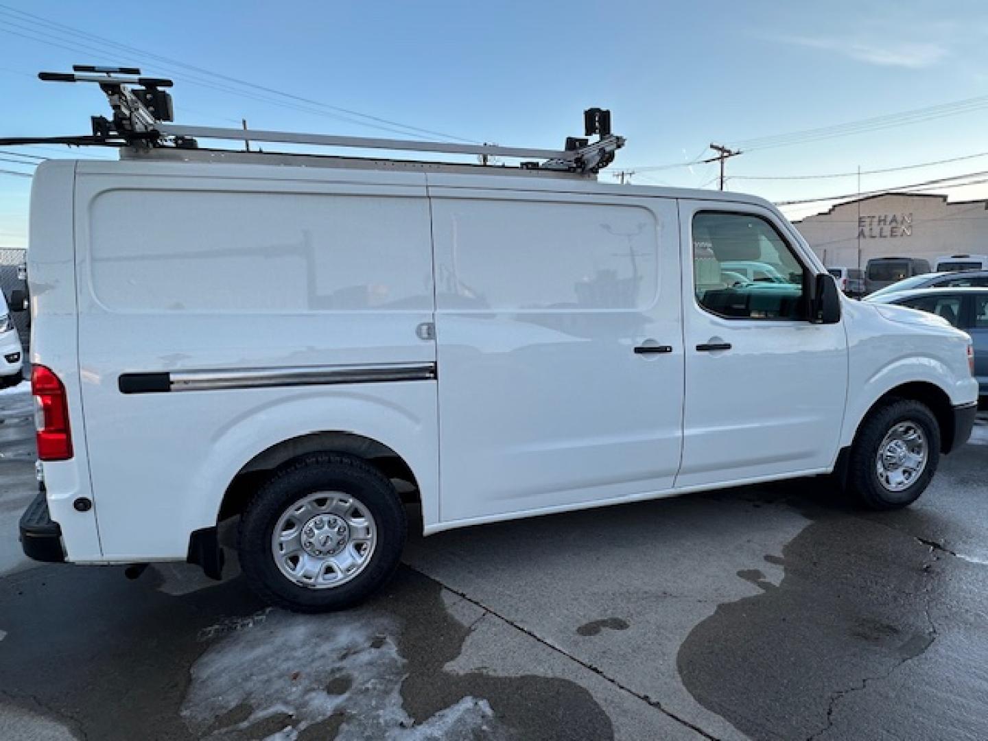 2021 White /Gray Nissan NV Cargo 2500 HD S V6 (1N6BF0KY2MN) with an 4.0L V6 engine, 5A transmission, located at 3200 1st Avenue North, Billings, MT, 59101, (406) 245-9055, 45.779270, -108.510742 - Very Hard to Find Nissan 3/4 Ton Cargo Van with Passenger Sliding Door, Power Windows, Power Door Locks, Remote Entry, Exterior Security Lock Hasps, Adrian Shelving and Commercial Drawers, Bulk Head, Adrian Roof Rack and Much More; Only 52,000 Miles. CarFax Dealer. Auto Brokers of Montana/AA&A Au - Photo#3