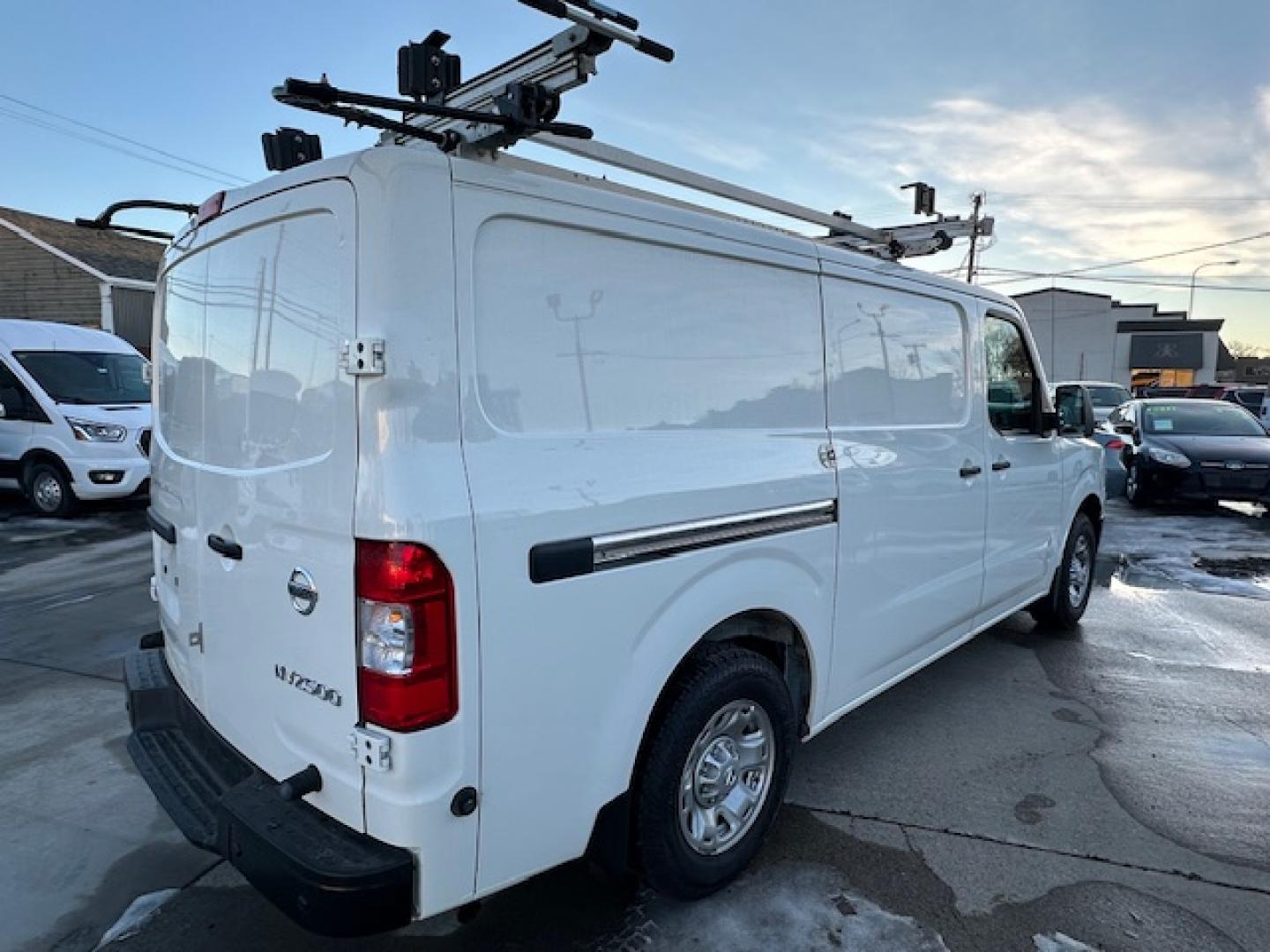 2021 White /Gray Nissan NV Cargo 2500 HD S V6 (1N6BF0KY2MN) with an 4.0L V6 engine, 5A transmission, located at 3200 1st Avenue North, Billings, MT, 59101, (406) 245-9055, 45.779270, -108.510742 - Very Hard to Find Nissan 3/4 Ton Cargo Van with Passenger Sliding Door, Power Windows, Power Door Locks, Remote Entry, Exterior Security Lock Hasps, Adrian Shelving and Commercial Drawers, Bulk Head, Adrian Roof Rack and Much More; Only 52,000 Miles. CarFax Dealer. Auto Brokers of Montana/AA&A Au - Photo#4