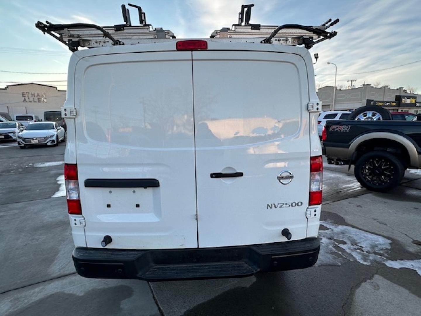 2021 White /Gray Nissan NV Cargo 2500 HD S V6 (1N6BF0KY2MN) with an 4.0L V6 engine, 5A transmission, located at 3200 1st Avenue North, Billings, MT, 59101, (406) 245-9055, 45.779270, -108.510742 - Very Hard to Find Nissan 3/4 Ton Cargo Van with Passenger Sliding Door, Power Windows, Power Door Locks, Remote Entry, Exterior Security Lock Hasps, Adrian Shelving and Commercial Drawers, Bulk Head, Adrian Roof Rack and Much More; Only 52,000 Miles. CarFax Dealer. Auto Brokers of Montana/AA&A Au - Photo#6