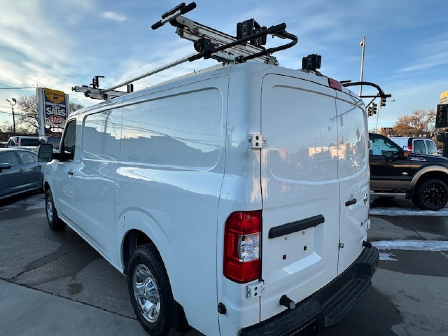 2021 White /Gray Nissan NV Cargo 2500 HD S V6 (1N6BF0KY2MN) with an 4.0L V6 engine, 5A transmission, located at 3200 1st Avenue North, Billings, MT, 59101, (406) 245-9055, 45.779270, -108.510742 - Very Hard to Find Nissan 3/4 Ton Cargo Van with Passenger Sliding Door, Power Windows, Power Door Locks, Remote Entry, Exterior Security Lock Hasps, Adrian Shelving and Commercial Drawers, Bulk Head, Adrian Roof Rack and Much More; Only 52,000 Miles. CarFax Dealer. Auto Brokers of Montana/AA&A Au - Photo#7