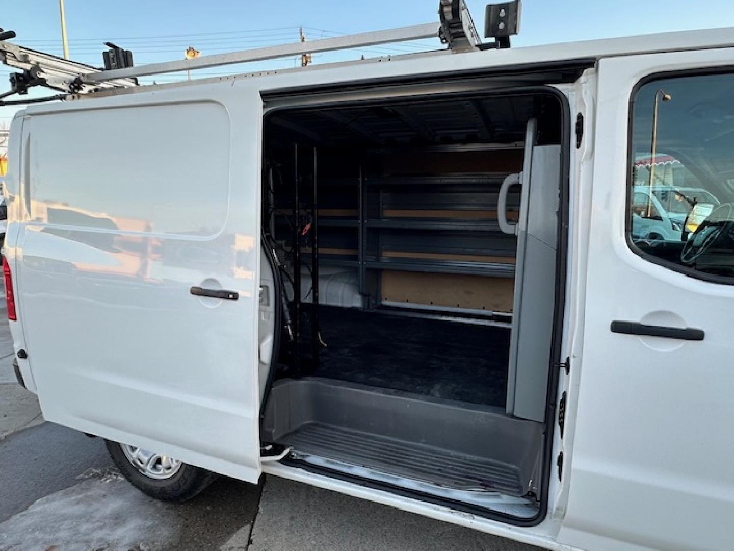 2021 White /Gray Nissan NV Cargo 2500 HD S V6 (1N6BF0KY2MN) with an 4.0L V6 engine, 5A transmission, located at 3200 1st Avenue North, Billings, MT, 59101, (406) 245-9055, 45.779270, -108.510742 - Very Hard to Find Nissan 3/4 Ton Cargo Van with Passenger Sliding Door, Power Windows, Power Door Locks, Remote Entry, Exterior Security Lock Hasps, Adrian Shelving and Commercial Drawers, Bulk Head, Adrian Roof Rack and Much More; Only 52,000 Miles. CarFax Dealer. Auto Brokers of Montana/AA&A Au - Photo#13